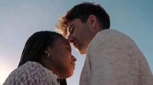 couple facing each other with eyes closed