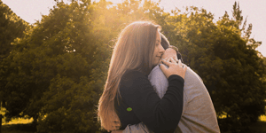 Man and woman embracing