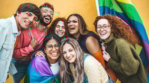 Group of LGBTQ+ people celebrating Pride
