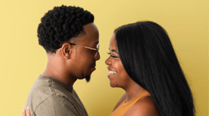 POC couple hugging yellow background-1