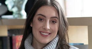 brunette woman smiling to camera